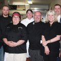  Chopped in the Ozarks masters of ceremonies Joe Fennel, right, and Suzie Stephens, second from righ...