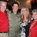  Hosts Tom and Colleen Pagnozzi, center, talk with Norm and Caroline DeBriyn at the May 1 Grand Slam...