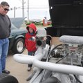  Billy Moore, left, of Gravette, talks on Saturday with his grandson Matthew Moore, 8, of Bentonvill...