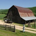 Hubert Ferguson heads to his barn on his Boxley Valley land Thursday afternoon. Ferguson and others ...