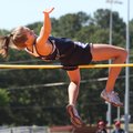 Springdale Har-Ber’s Kirstie Hesseltine clears 5 feet, 7 inches to win the girls high jump Saturday ...