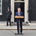 Britain's Prime Minister Gordon Brown reads a statement to the media statement outside 10 Downing St...
