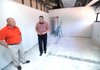 Fayetteville Police Department Capt. Kenny Yates, right, and Chief Greg Tabor tour the former municipal courtroom Thursday being remodeled to serve the department’s detective division during a tour of the building in Fayetteville.