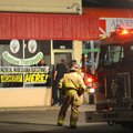 Billings Police and Fire Departments investigate the scene of a fire bomb that was thrown through th...