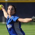 Rogers High’s Lauren Smith delivers a pitch during the second inning against Fayetteville on March 3...