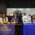Springdale Har-Ber’s Molly Bowman, from left, Allen Bowman and Alyssa Deshong smile after signing le...