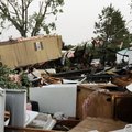 Homes are in shambles in the mobile home community of Prairie Creek Village in Slaughterville, Okla....