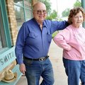 A.T. Smith and his wife Georgia Mae Smith in front of their store in Hindsville.