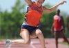 Heritage’s Brittany McClain leaps during the long jump competition during the Class 7A state outdoor track and field championships April 29 at John McDonnell Field in Fayetteville.