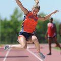 Heritage’s Brittany McClain leaps during the long jump competition during the Class 7A state outdoor...