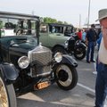 Delbert Hall of Siloam Springs looks over a Ford Model T on Wednesday at Frisco Park in Rogers. The ...