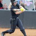 Bentonville’s Kali Piha gets a base hit against the Fayetteville on Tuesday in Bentonville.