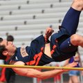 Rogers Heritage’s Sam Mayhall competes in the high jump Wednesday during the Arkansas High School De...