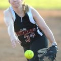 Springdale High’s Chloe Brown delivers a pitch during the second inning of the Lady Bulldogs’ 2-1 lo...