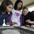  Fourth-graders Emma Johnson, 9, left, Alice Wang, 10, Michelle Shaw, 10, and Makaylee Campbell, 10,...