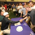 Fayetteville’s T.J. Foster, left, is congratulated by teammates Levi Foster, right, Clarke Smithson,...