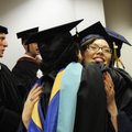  Jori McCleland, right, hugs Debbie Diehm on Thursday before entering the Shiloh Christian’s graduat...