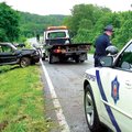 ROLLOVER ACCIDENT - Trooper George Enke investigates a one-vehicle accident on Arkansas 72 shortly a...