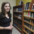 Claire Marie Poteet stands in the library at Ambassadors for Christ Academy in Bentonville. Poteet p...