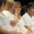 NURSE PINNING CEREMONY - Tony Attwood, right, looks to his graduating classmates Saturday during Nor...