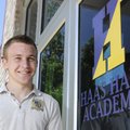 Haas Hall Academy senior Matthew Heckmann stands in front of the Fayetteville school.  Heckman is pl...