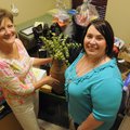Rhonda Woodruff, left, and Stephanie Huy, both volunteers for the Saturday Spring Fling fundraiser f...