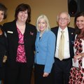 Arkansas first lady Ginger Beebe, center, is joined at Butterflies and Blooms by Saving Grace founde...