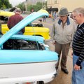 SIMPLER TIME - Craig Peterson, right, and his father Phell Peterson admire the simplicity evident un...