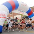 Runners leave the starting line Saturday for the 5K part of the annual Kendrick Fincher Youth Run & ...