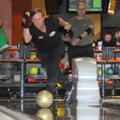 Mark Williams, of Beaumont, Texas, bowls Sunday while warming up for the finals of the NW Arkansas O...