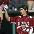 Arkansas' Brett Eibner, who hit a pair of doubles and scored a run at the plate in a 5-2 loss Tuesda...