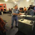 Election worker Donnie Morgan assists voters on Tuesday at the Farmington Baptist Church. Voters wer...