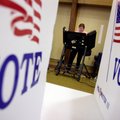 Marie Chandler of Bentonville votes in the 34th precinct in the non-presidential primaries Tuesday a...