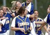 Jumping for joy 
Mountain Home’s Jenna Gilbert (center) leaps into the arms of Alex Osmon after the Lady Bombers’ 4-3 victory over Lake Hamilton in a semifinal game of the Class 6A softball tournament Tuesday at the Sherwood Sports Complex.
