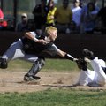 Prairie Grove catcher Dakota Daniels, left, reaches out to tag Shiloh Christian’s Josh Salsbury at t...