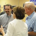 Kelley Cradduck, left, talks with supporters Charlie Holyfield, right, and Holly Holyfield at a elec...