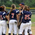 Rogers Heritage coach Trace Briggs talks to his team against Springdale High on May 11 at J.B. Hunt ...