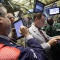 Traders work on the floor of the New York Stock Exchange on Friday. 