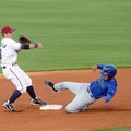  Northwest Arkansas second baseman Johnny Giavotella forces Tulsa’s Bronson Sardinha out as he tries...