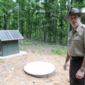Mark Clippinger, park superintendent at Hobbs State Park-Conservation Area, shows the seismic monito...