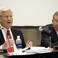 University of Arkansas board of trustees Chairman John Ed Anthony (right) listens as UA System Presi...