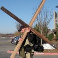 Joshua Sarhan leaves the parking lot of Fellowship Bible Church in Rogers on Feb. 17. The 33-year-ol...