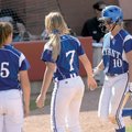 Bryant’s Cassidy Wilson, right, is congratulated at the plate after hitting a two run home run durin...