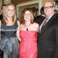 Heart Gala supporters Steve and Lori Collins, from right, enjoy the VIP reception with daughter Ambe...