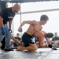 RALLY RUMBLE - Jeff Johnson delivers a pounding to Aaron Campbell.