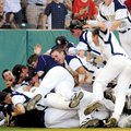 Shiloh Christian players dogpile behind home plate Saturday after winning the Class 4A State Champio...