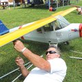 Jerry Shrum of Springdale works on his one-third scale J-4 Piper Cub during the Ozark Flyers’ second...