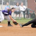 Fayetteville third baseman Rebecca Cantu tags out Bentonville’s Alex Cooper during a May 11 game in ...