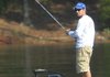 Stetson Blaylock of Benton waits for a fish to bite during first-day action of the FLW Chevy Open on Lake Ouachita. Blaylock is in 11th place after weighing in 14 pounds, 2 ounces.