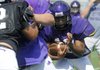 Fayetteville’s Brice Gahagans looks for space during Monday’s practice in Fayetteville.